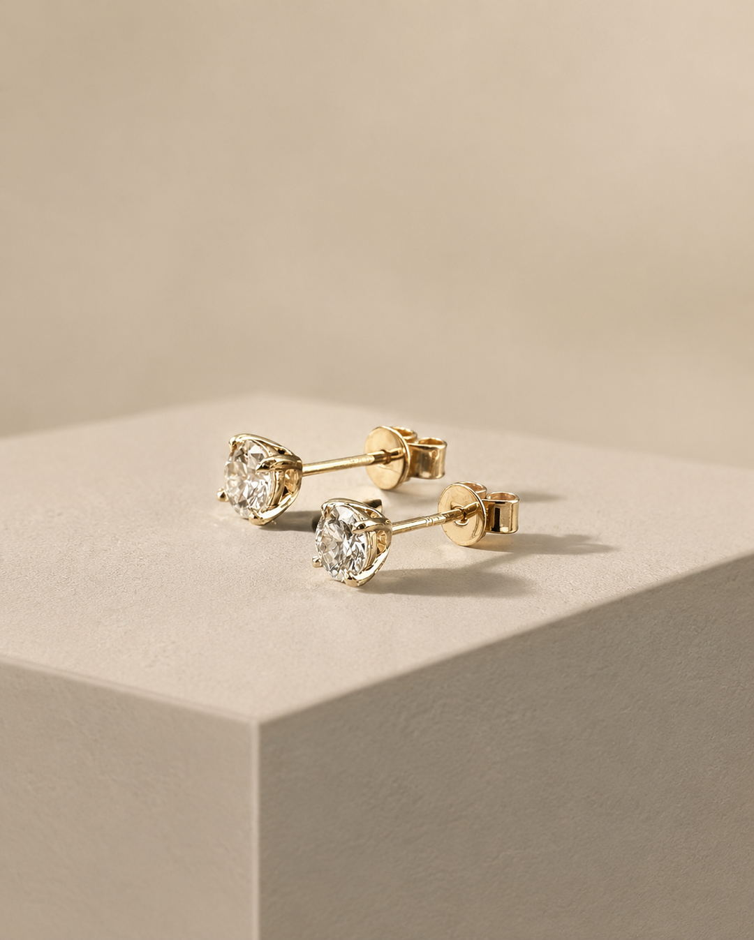 CHR SOLITAIRE ØRESTIK GULD 14 K