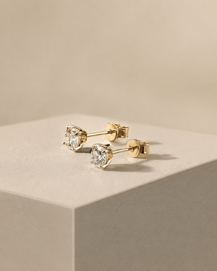 CHR SOLITAIRE ØRESTIK GULD 14 K