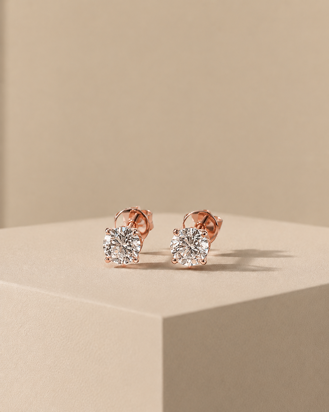 CHR SOLITAIRE ØRESTIK ROSAGULD 14 K